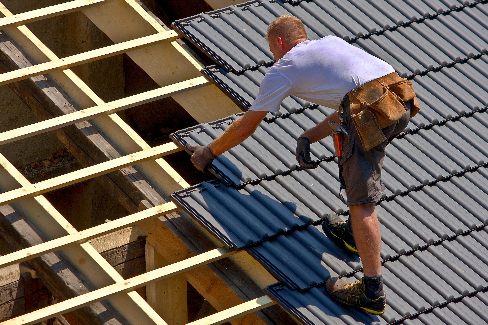 Debating whether to tackle your residential roofing project yourself or hire a professional? This guide breaks down the pros and cons of DIY vs. hiring a pro.